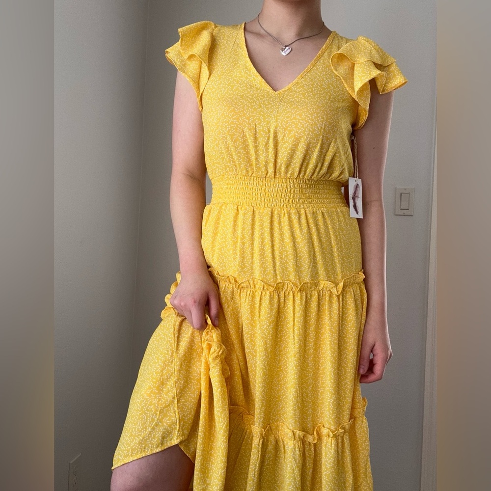 JS Bright yellow midi dress with ruffles and a flowy skirt